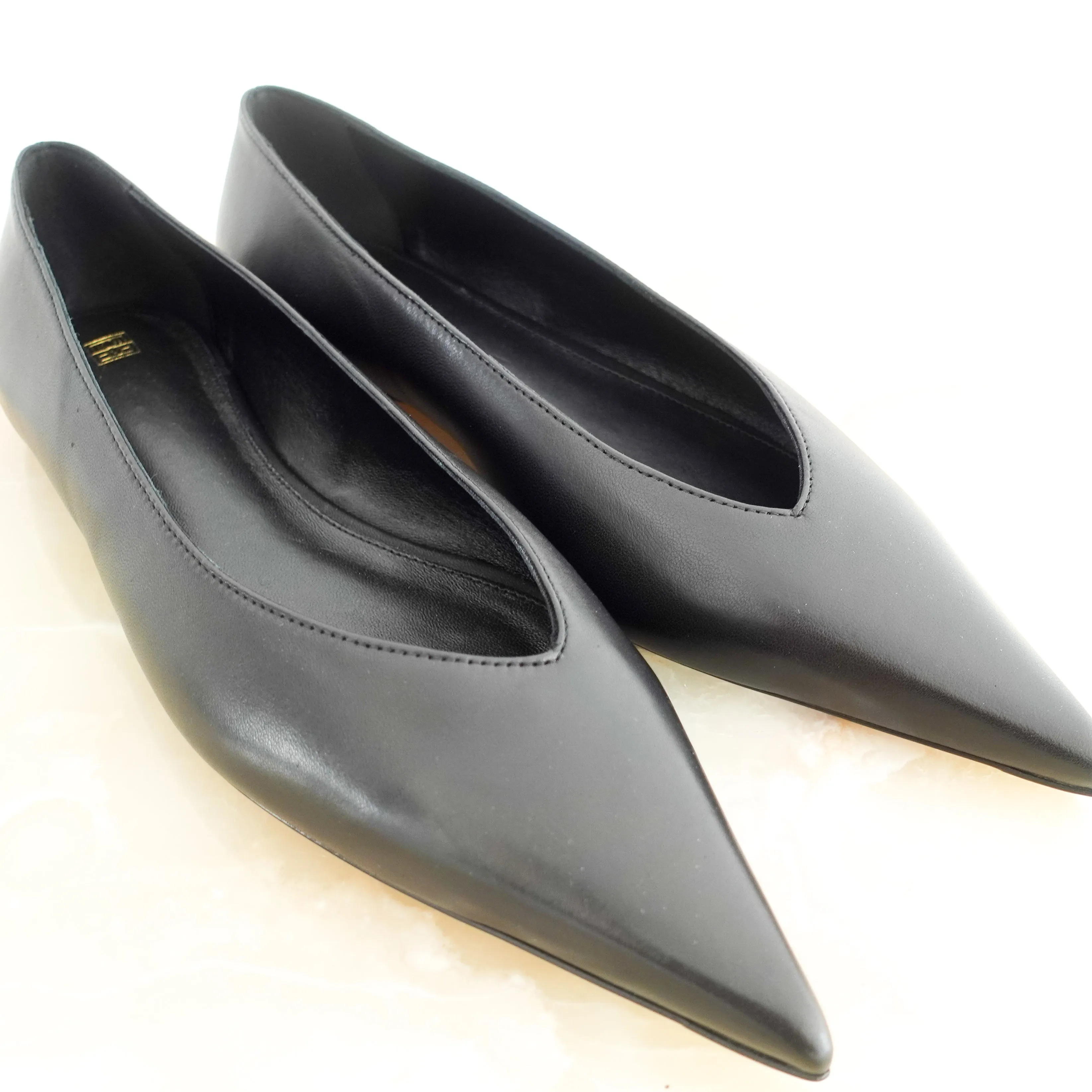 Asymmetric ballet flats RRP £450